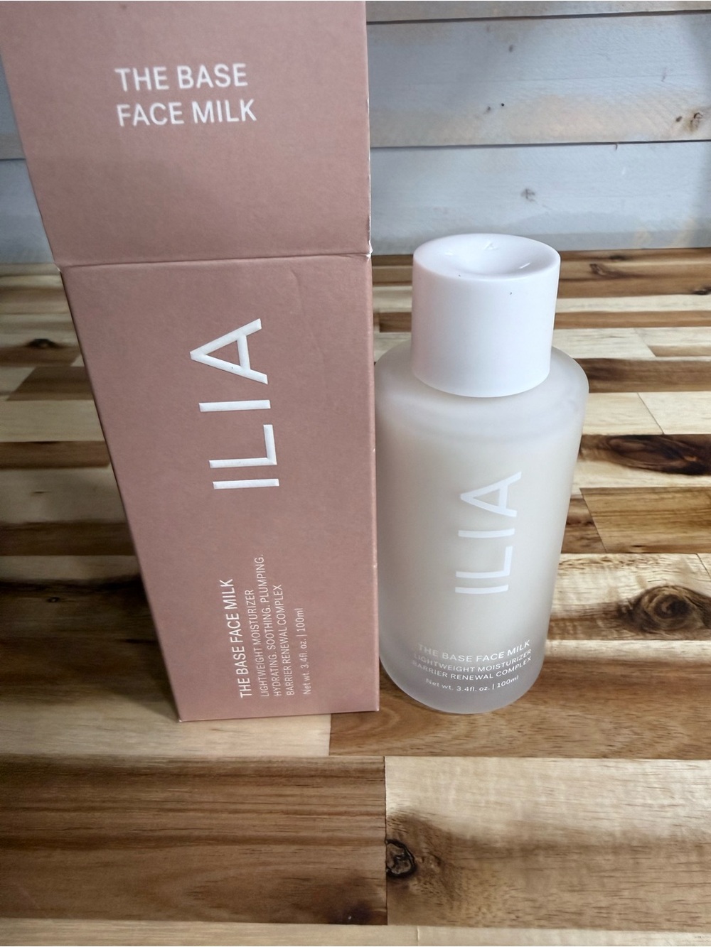 ILIA The Base Face Milk - Pale Pink & Frosted White Bottle